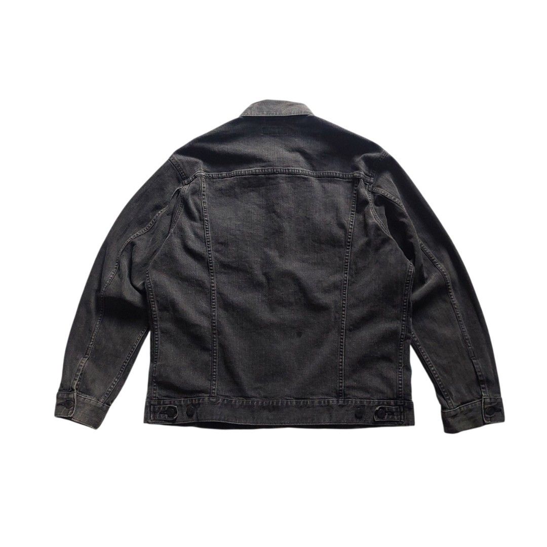 Uniqlo Denim Jacket (Spandex Cotton) (Category: Coats, Jackets and Outerwear) located in Quezon City. Submitted by y3thriftshop (Listing ID 1470590276, Image 3). Description: Tag: Uniqlo Denim Jacket (Spandex Cotton) Color : Washed Black Size : XL on Tag Dimension : 23x26.5 Sleeve Lenght : 24 Condition : Good Color Rate : 9/10 Price : P799.00 Issue : none RFS : Buy and Sell Additional Information : - 4 Pockets Please read: - Color may vary due to