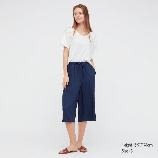 Uniqlo Relaco 3/4 Navy Blue (Category: Shorts) located in La Trinidad. Submitted by rare_closet_finds (Listing ID 1470655406, Image 3). Description: - Brand: Uniqlo - Color: Navy blue -like new - Style: Cropped, wide-leg cut (hits below the knee) - Waistband: Elastic with matching drawstring - Pockets: Two side pockets - Size L -cut tags.