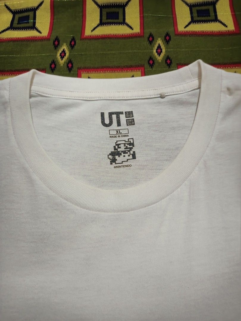 Uniqlo Super Mario White Tee (Category: Tshirts & Polo Shirts ) located in Lapu Lapu. Submitted by rebuild.arkives (Listing ID 1470622091, Image 3). Description: Uniqlo Super Mario White Tee ‎ ‎📏 Size Guide (Inches): ‎Length: 31 ‎Width: 22 ‎ ‎Color: 10/10 ‎Condition: 10/10 ‎Issue: None ‎ ‎📝 Heads up: ‎• This is a thrift item so please manage your expectations. ‎• Color may slightly differ due to lighting. ‎• Washed and ready to wear. ‎• Shippin