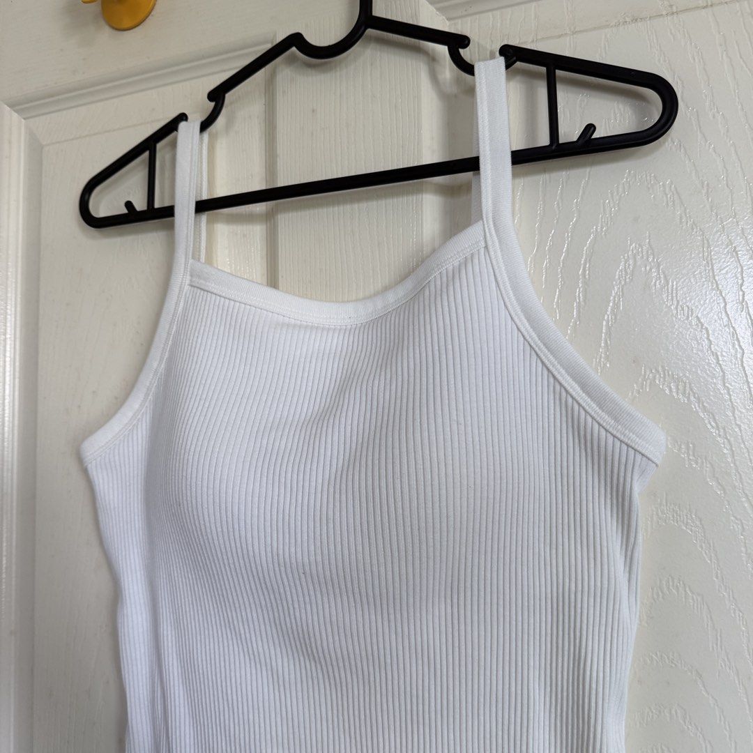 Uniqlo White Ribbed Spaghetti Strap Bra Top (Category: Sleeveless) located in San Pedro. Submitted by clothingbyklar (Listing ID 1470559820, Image 2). Description: Bought from the store and just washed RFS: Realized after that I had a similar top already Large on tag but stretches until semi XL :) I love love love Uniqlo bra tops!!!.