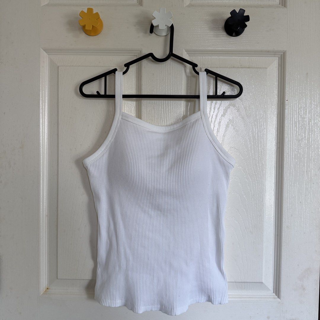 Uniqlo White Ribbed Spaghetti Strap Bra Top (Category: Sleeveless) located in San Pedro. Submitted by clothingbyklar (Listing ID 1470559820, Image 1). Description: Bought from the store and just washed RFS: Realized after that I had a similar top already Large on tag but stretches until semi XL :) I love love love Uniqlo bra tops!!!.