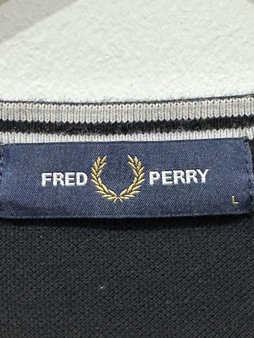 V neck fred perry (Category: Tshirts & Polo Shirts ) located in Manila. Submitted by wegotthrifts (Listing ID 1470601725, Image 3). Description: 22x29 dimension 9.8/10 color rate No issue.