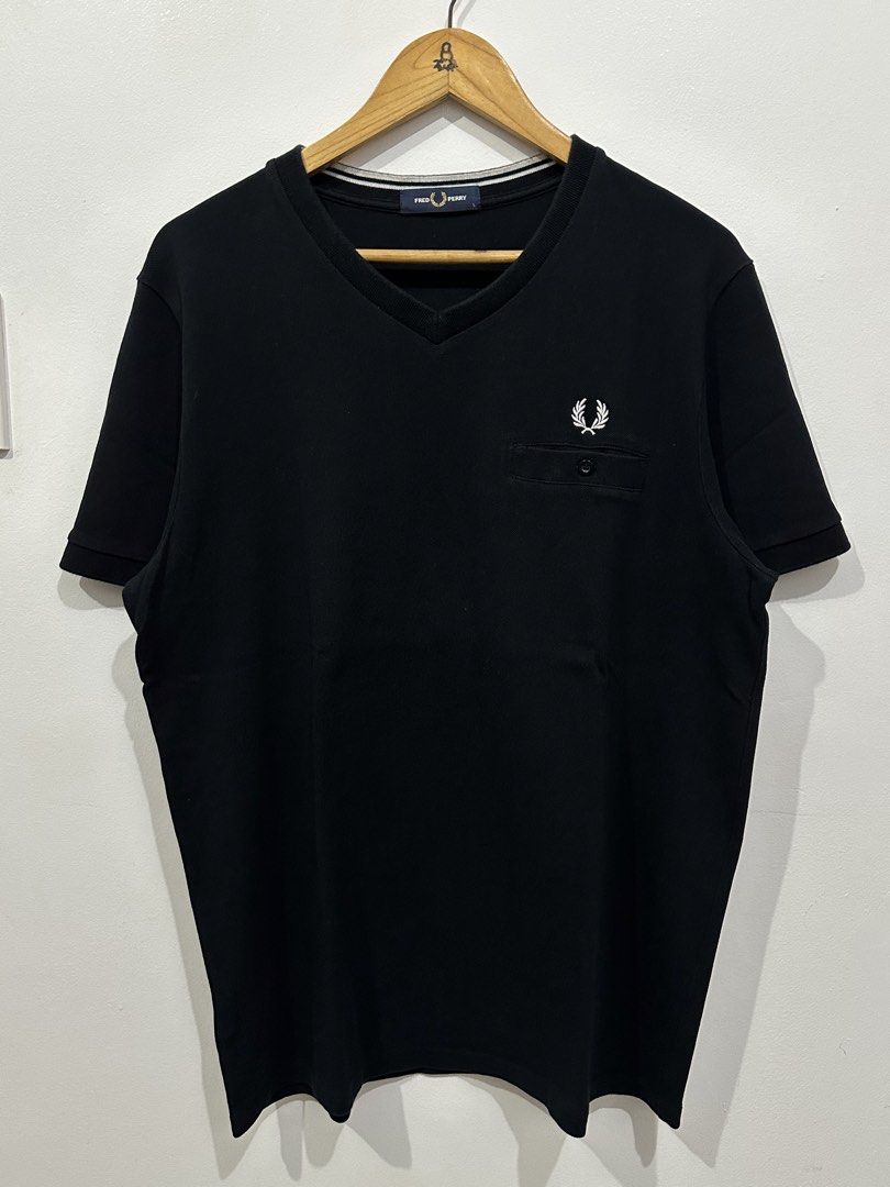 V neck fred perry (Category: Tshirts & Polo Shirts ) located in Manila. Submitted by wegotthrifts (Listing ID 1470601725, Image 1). Description: 22x29 dimension 9.8/10 color rate No issue.