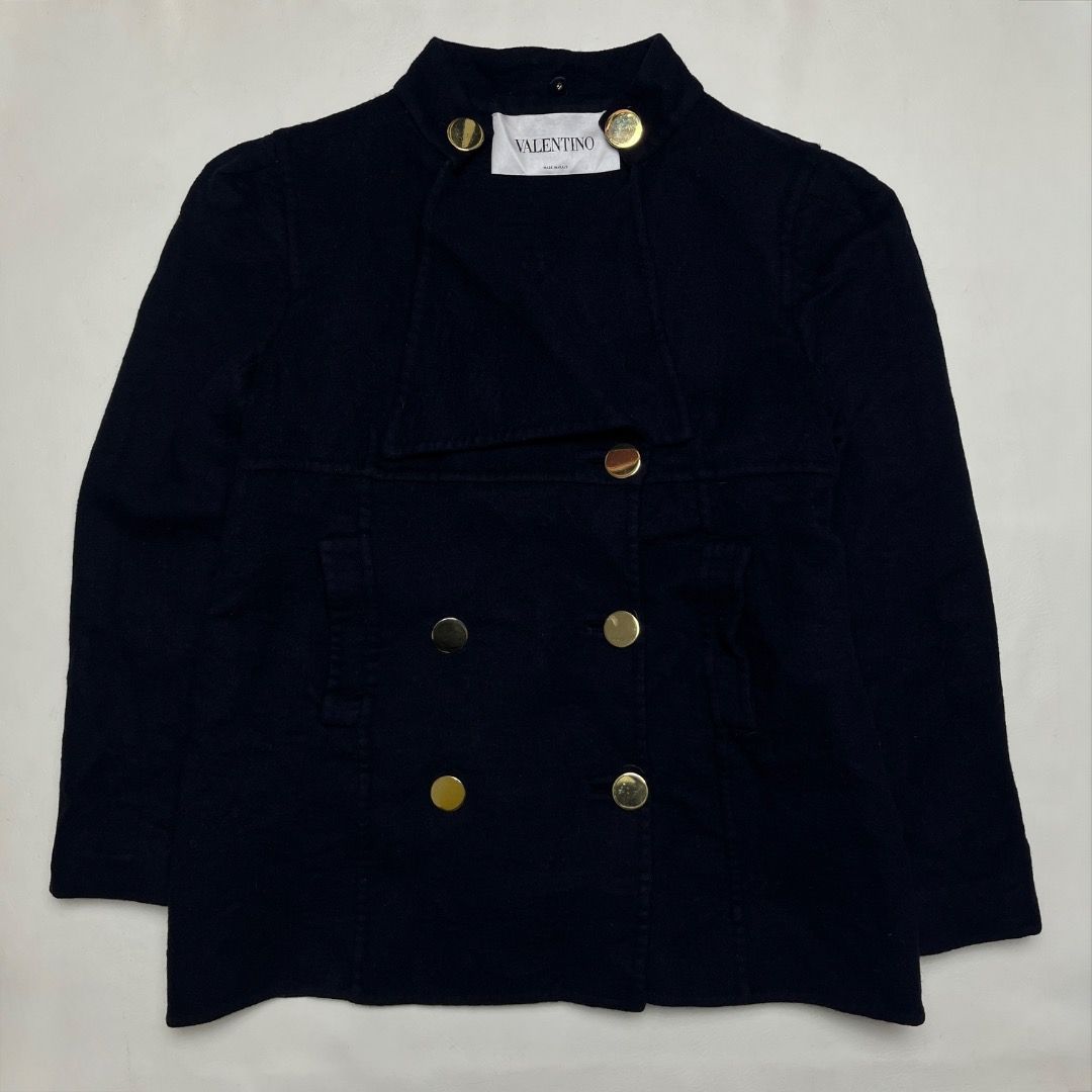 Valentino Navy Double-Breasted Wool Cashmere Jacket (Category: Coats, Jackets and Outerwear) located in Caloocan City. Submitted by achilles_grails (Listing ID 1470565832, Image 1). Description: - Brand: Valentino - Style: Double-breasted jacket with high stand collar and folded lapel - Color: Dark navy blue - Material: 90% virgin wool, 10% cashmere (Silk lining) - Origin: Made in Italy - Size: 8 - Details: Gold-tone metal hardware, heavy warm fa