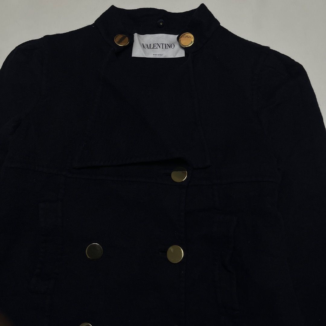 Valentino Navy Double-Breasted Wool Cashmere Jacket (Category: Coats, Jackets and Outerwear) located in Caloocan City. Submitted by achilles_grails (Listing ID 1470565832, Image 2). Description: - Brand: Valentino - Style: Double-breasted jacket with high stand collar and folded lapel - Color: Dark navy blue - Material: 90% virgin wool, 10% cashmere (Silk lining) - Origin: Made in Italy - Size: 8 - Details: Gold-tone metal hardware, heavy warm fa