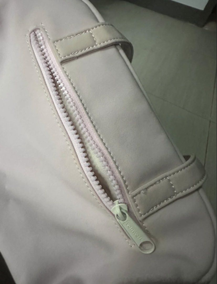 Vanwalk Pink Shoulder Bag with Front Pockets (Category: Shoulder Bags) located in Manila. Submitted by zayzay08 (Listing ID 1470728260, Image 3). Description: - Brand: Vanwalk - Color: Pastel Pink - Handles: Double top handles for easy carrying - Pockets: Two zipped front pockets (one with cute embroidered text) and a full-length rear zipper compartment - Closure: Dual main zipper closure - Interior: Spacious cream fabric lining - Extras: Side ri