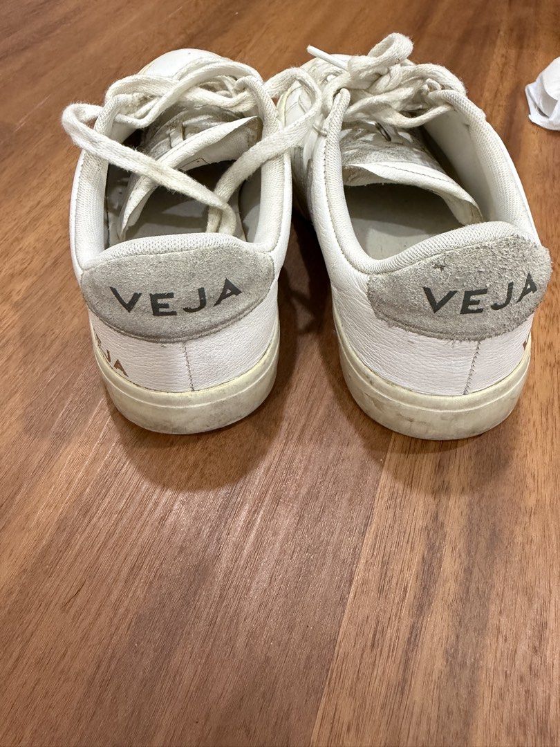 Veja Esplar White Leather Sneakers (Category: Sneakers) located in Makati City. Submitted by marowebg (Listing ID 1470627114, Image 2). Description: White leather sneakers from Veja. Grey suede heel tab with stamped logo. Classic lace-up front, rubber soles with moderate wear on the treads. Uppers have some scuffs and creasing from regular use. Soles show dirt buildup from walking outside. Comfortable daily wear shoes. Just needs cleaning but nev