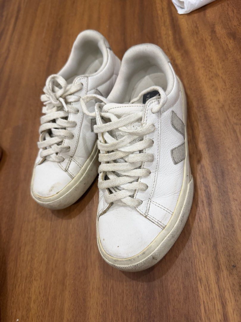 Veja Esplar White Leather Sneakers (Category: Sneakers) located in Makati City. Submitted by marowebg (Listing ID 1470627114, Image 1). Description: White leather sneakers from Veja. Grey suede heel tab with stamped logo. Classic lace-up front, rubber soles with moderate wear on the treads. Uppers have some scuffs and creasing from regular use. Soles show dirt buildup from walking outside. Comfortable daily wear shoes. Just needs cleaning but nev