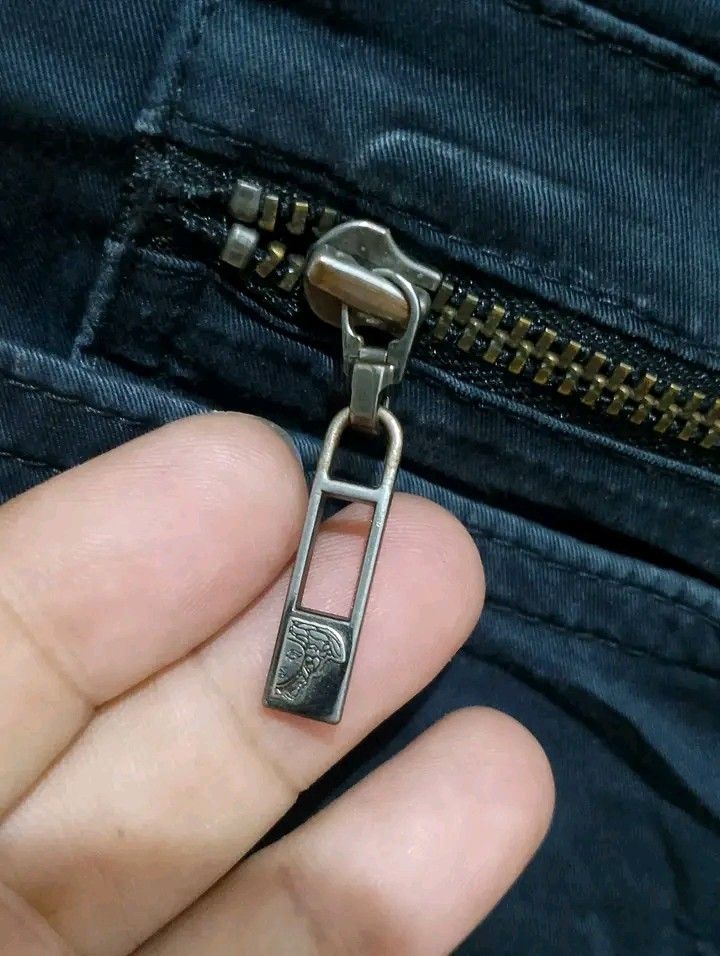 VERSACE (Category: Jeans) located in Taguig. Submitted by clothingselection (Listing ID 1470566749, Image 3). Description: PTPA VERSACE SLIM PANTS WIDTH 32 LENGTH 42 HEM 7 VERYGOOD CONDITION NID WASH FRESH FROM BALE MISSING ISANG PULLER SA BACK PERO WORKING ZIPPER.