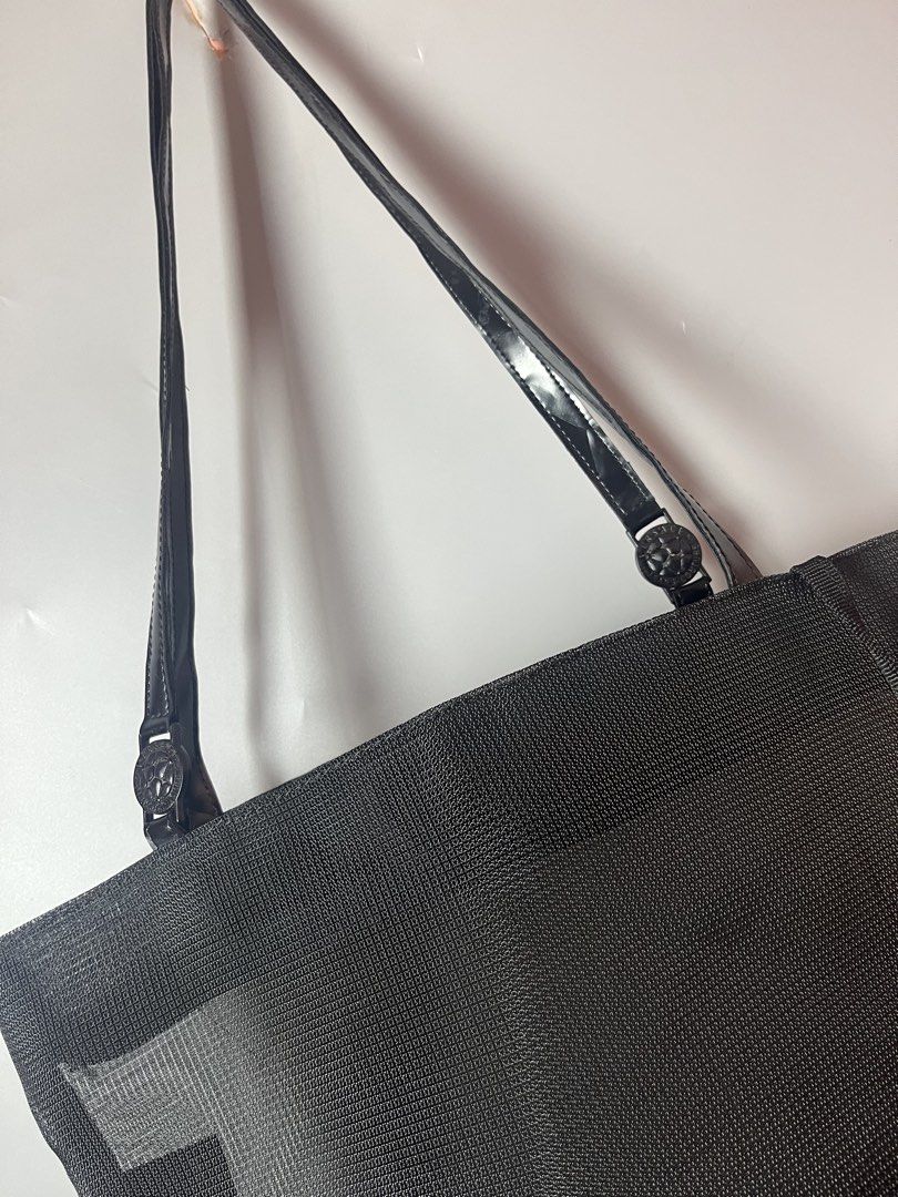 Versace mesh nylon beach bag w/purse (Category: Tote Bags) located in Quezon City. Submitted by theideal (Listing ID 1470687373, Image 2). Description: Read first before buy Legit/Authentic Versace mesh nylon tote bag w/purse No box Medium size Still in good and presentable condition No major flaws Minor sign of use only See picture details posted.