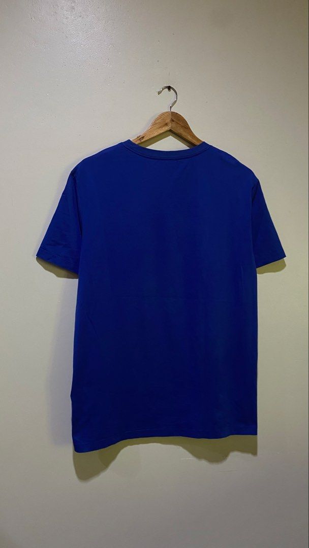 Versace T shirt (Category: Coats, Jackets and Outerwear) located in Nagcarlan. Submitted by nsh.c (Listing ID 1470612099, Image 2). Description: Excellent condition Cr:9.5/10 blue na blue pa Dimes:28X21 Solid padin .