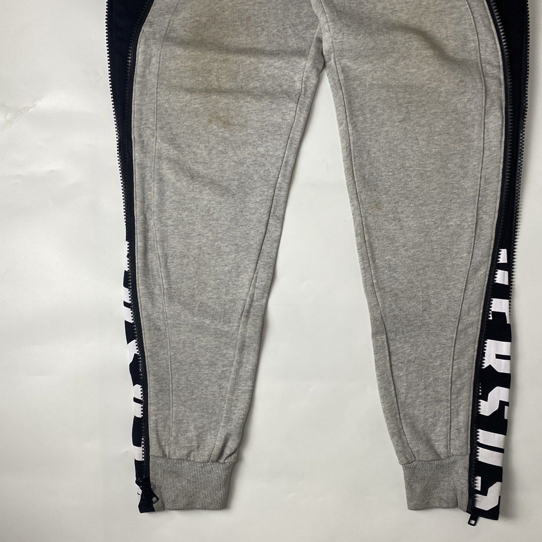 Versus Versace Active Zip Seam Joggers (Category: Joggers) located in Bacolod City. Submitted by rewear.conceptual (Listing ID 1470726135, Image 3). Description: Versus Versace Active Zip Seam Joggers Condition: 9.5/10 Color rate: 9.5/10 Tagged as: large Waist: 32 (garterized) Length: 42 Leg opening: 4 (stretchable cuff) Inseam: 31 Front rise: 13.5 Thigh: 12.5 Knee: 9 Message seller if interested Always double check the items description before m