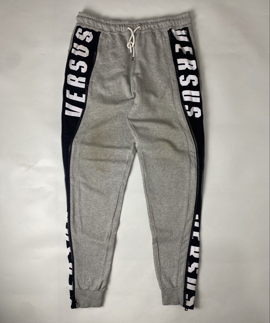 Versus Versace Active Zip Seam Joggers (Category: Joggers) located in Bacolod City. Submitted by rewear.conceptual (Listing ID 1470726135, Image 1). Description: Versus Versace Active Zip Seam Joggers Condition: 9.5/10 Color rate: 9.5/10 Tagged as: large Waist: 32 (garterized) Length: 42 Leg opening: 4 (stretchable cuff) Inseam: 31 Front rise: 13.5 Thigh: 12.5 Knee: 9 Message seller if interested Always double check the items description before m