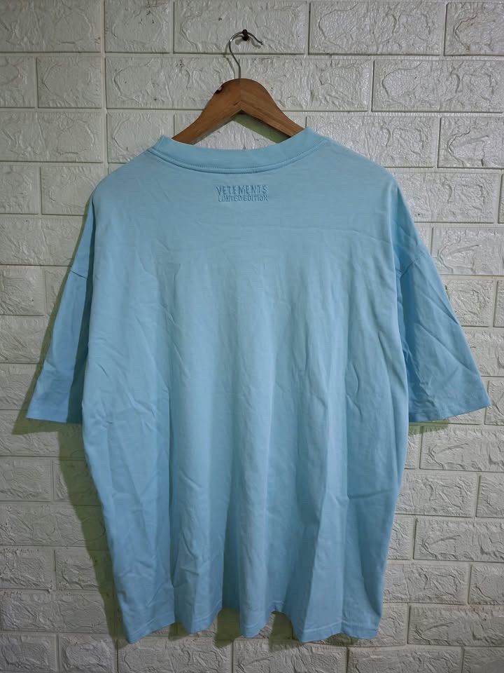 VETEMENTS BASIC LOGO SHIRT (Category: Tshirts & Polo Shirts ) located in Bulacan. Submitted by bleue.finds (Listing ID 1470660764, Image 2). Description: VETEMENTS BASIC LOGO SHIRT 24 - width 29 - length as new no major issues 1 dot stain removable need wash only.