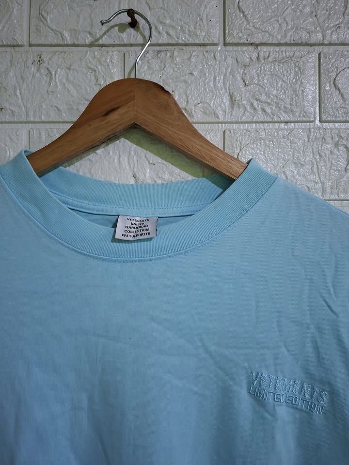 VETEMENTS BASIC LOGO SHIRT (Category: Tshirts & Polo Shirts ) located in Bulacan. Submitted by bleue.finds (Listing ID 1470660764, Image 3). Description: VETEMENTS BASIC LOGO SHIRT 24 - width 29 - length as new no major issues 1 dot stain removable need wash only.