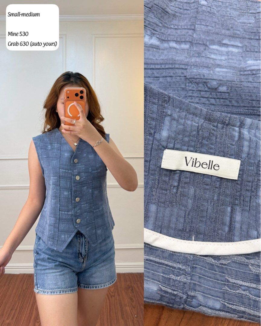 Vibelle Blue Textured Button-Down Vest Small-Medium (Category: Sleeveless) located in Manila. Submitted by angelll0123 (Listing ID 1470680513, Image 1). Description: - Brand: Vibelle - Color: Blue - Material: Textured fabric with a structured fit - Design: Sleeveless, pointed front hem, 4-button closure - Size: Fits Small to Medium - Style: Great layering piece for casual or smart-casual outfits.