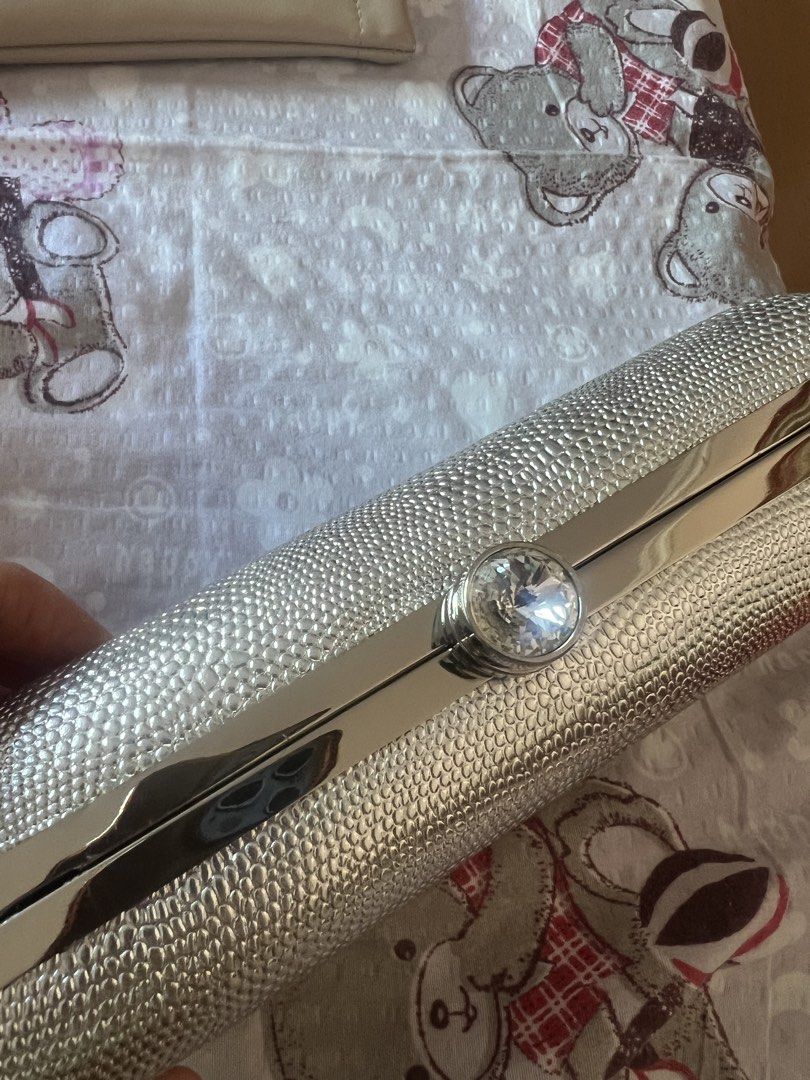 Victoria Secret silver evening bag (Category: Clutches) located in San Juan City. Submitted by iambernie (Listing ID 1470611729, Image 2). Description: A silver evening bag from Victoria Secret store in the US, has 4 perfumes inside hardly used The bag can be used to put money, cards lipstick on a night out . It comes in a pink pouch and silver box to keep the bag clean til the next occasion ! .