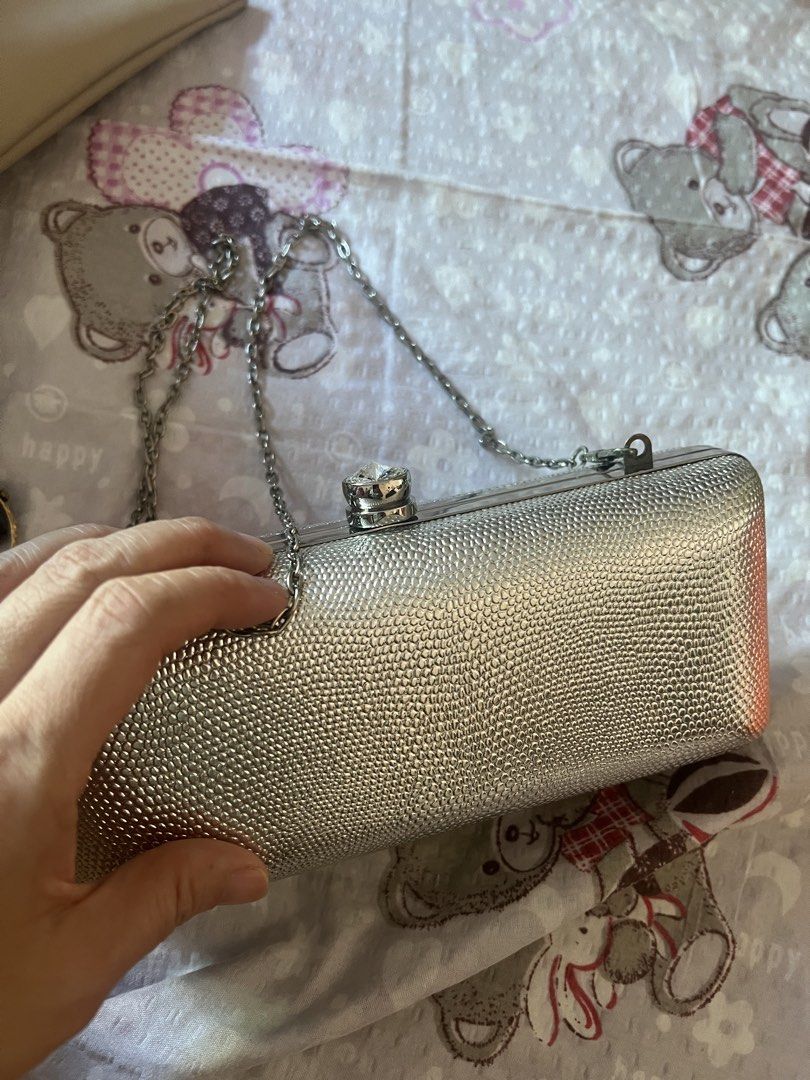Victoria Secret silver evening bag (Category: Clutches) located in San Juan City. Submitted by iambernie (Listing ID 1470611729, Image 3). Description: A silver evening bag from Victoria Secret store in the US, has 4 perfumes inside hardly used The bag can be used to put money, cards lipstick on a night out . It comes in a pink pouch and silver box to keep the bag clean til the next occasion ! .