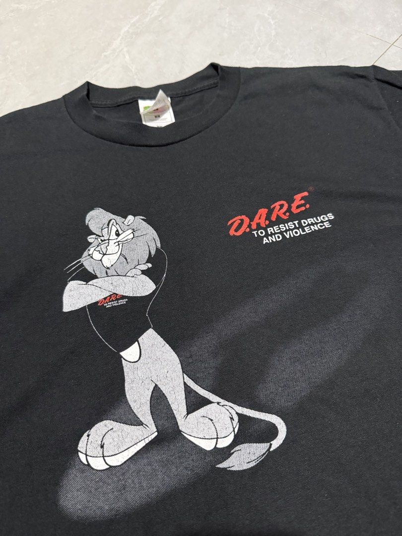 Vintage 1990s D.A.R.E. Tshirt (Category: Tshirts & Polo Shirts ) located in Calumpit. Submitted by Essentiality (Listing ID 1470579598, Image 2). Description: Vintage 1990s D.A.R.E. Tshirt 21x28 L on tag ₱700.