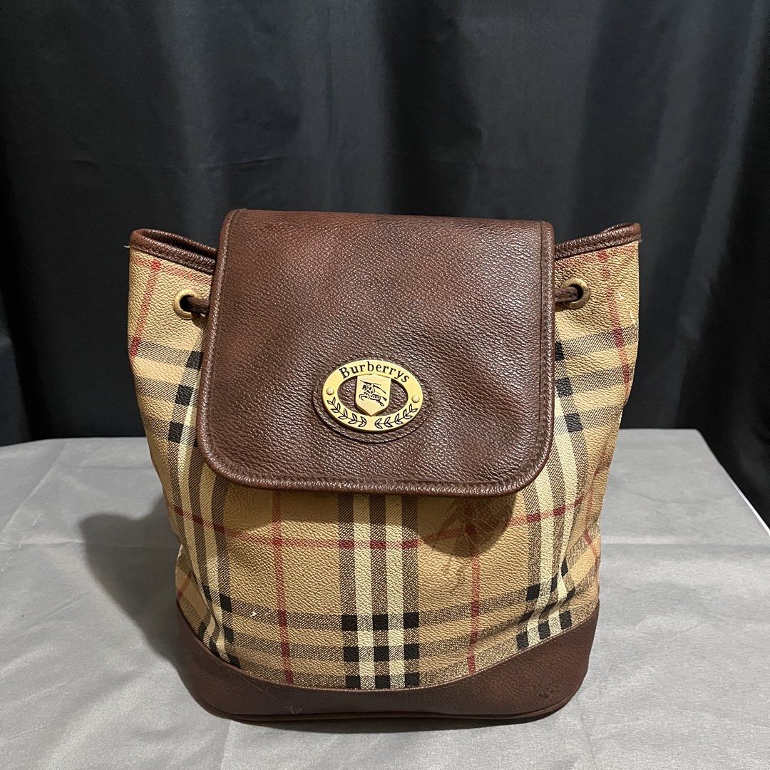 Vintage Burberry leather backpack nova plaid (Category: Luxury Bags & Wallets) located in Taguig. Submitted by maniladept. (Listing ID 1470695997, Image 2). Description: VINTAGE BURBERRY NOVA PLAID LEATHER BACKPACK AUTHENTIC GUARANTEED NEEDS BAG SPA FLAWS DUE OF ITS AGE POWDERING INSIDE AND LEATHER SCRATCHES NEGOTIABLE ITEM ONLY DM .