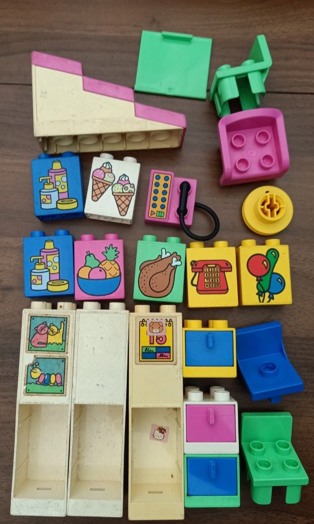 Vintage Lego Duplo (Category: Lego & Building Sets) located in Sorsogon. Submitted by divs4joy (Listing ID 1470593116, Image 2). Description: Lego Duplo vintage playhouse 1885❌❌❌❌ 👉 160pcs furniture+roof+others 👉 16pcs figures+animal 👉 with large green brick box. 👉 1pc 22x22 green baseplate 👉 as it is; WYSIWYG. 👉 see other photos for details..