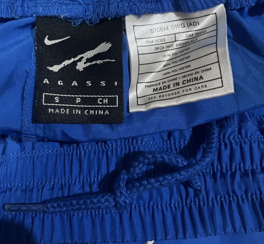 Vintage Nike Agassi Shorts (Blue) (Category: Shorts) located in Subic. Submitted by trashdimes2022 (Listing ID 1470698196, Image 3). Description: Size: Small - Medium Width: 26 - 32 Length: 20 Rise: 14 Hem: 20 .