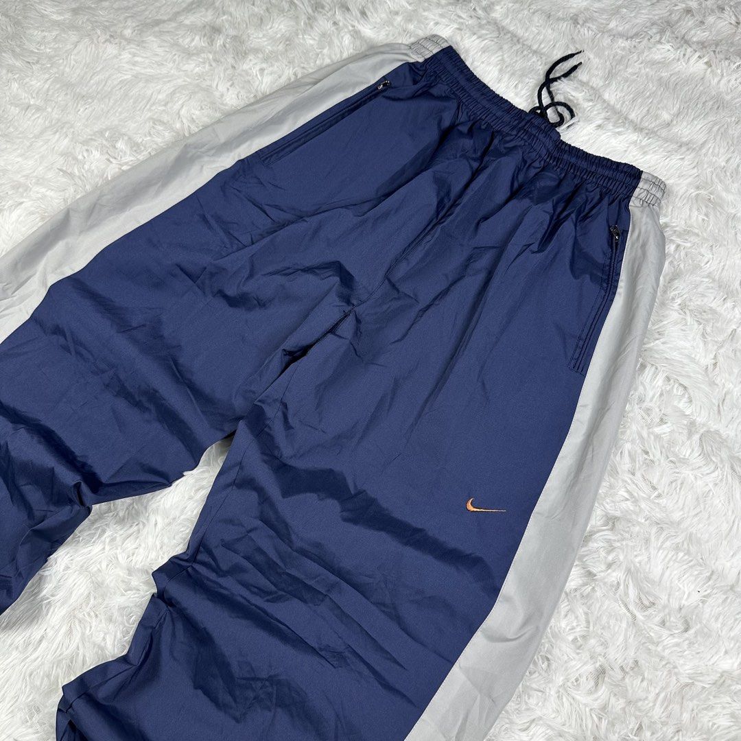 Vintage Nike Colorblock Trackpants (Category: Joggers) located in Mandaluyong City. Submitted by ikonicpieces (Listing ID 1470726154, Image 2). Description: Dimes: W: 26” - 39” L: 43.5” Front Rise: 13.5” Leg Hole: 5” - 8” (Ribbings) Size on tag: XXXL (Fits L-XL) Color rate: 9/10 Condition: 9/10 Issue: X MINE: 749 + SF 💳 PAYMENT: GCash / GoTyme 🚚 SHIPPING: J&T. Payment first before shipping. 📍 PLEASE NOTE -Thrifted item. Please manage your expe