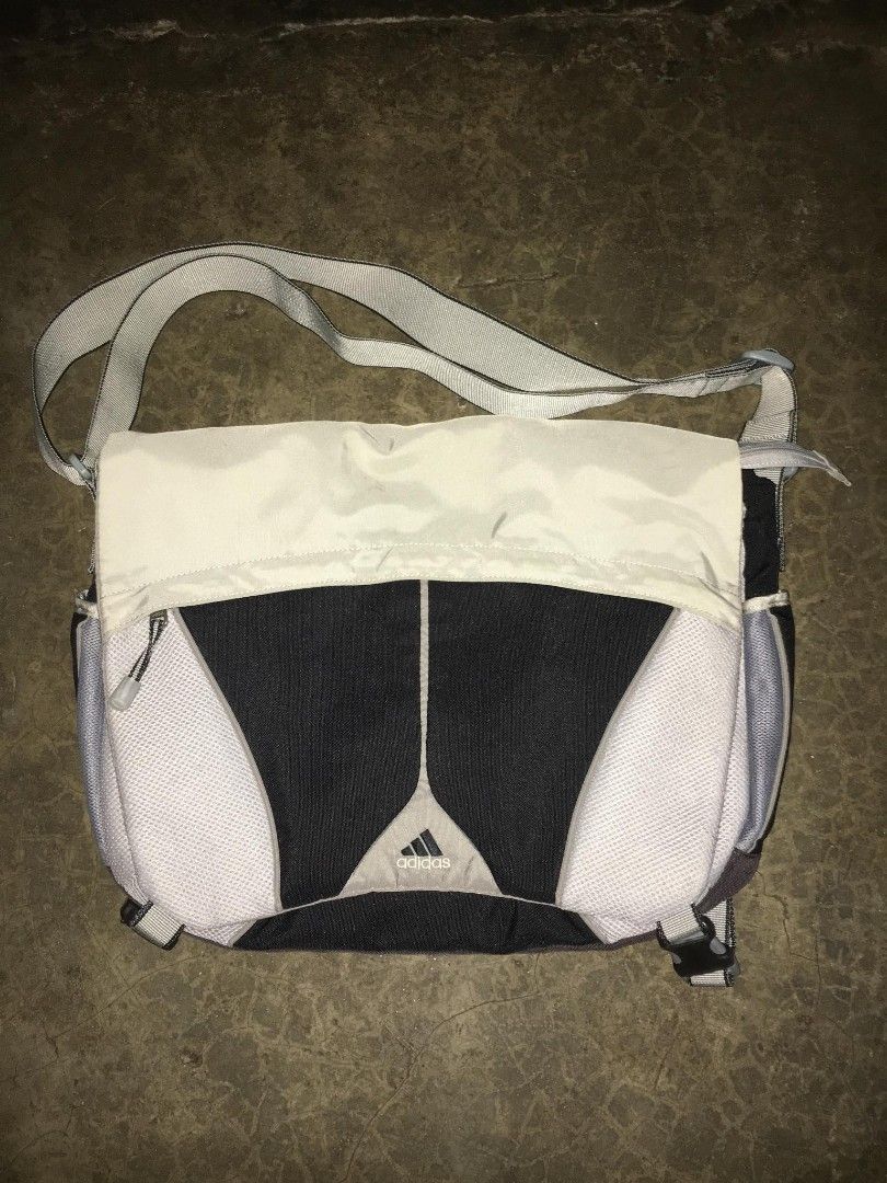 vintage Y2K Adidas tech messenger/sling bag (Category: Sling Bags) located in Quezon City. Submitted by thriftyzx (Listing ID 1470710075, Image 1). Description: vintage Y2K Adidas tech messenger/sling bag condition: 9.5/10 Excellent Condition No issue Working all zipper walang himulmul 1800 Freeshipping Location: QC.