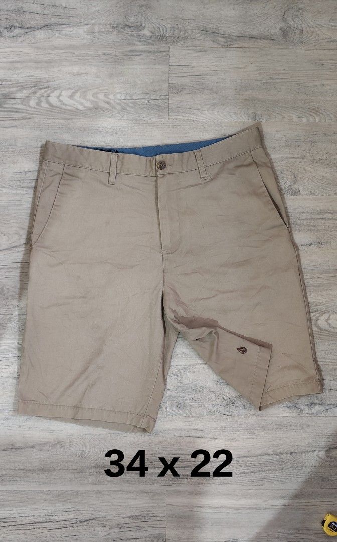 Volcom Chino Shorts Beige 34 x 22 (Category: Shorts) located in Quezon City. Submitted by truedeer_cda94c (Listing ID 1470602860, Image 1). Description: - Brand: Volcom - Style: Chino shorts - Color: Neutral beige with blue pocket lining - Details: Classic front button closure, belt loops, dual front hand pockets, dual back welt pockets - Branding: Embroidered Volcom stone logo on lower left leg and inner waistband - Condition: Great casual wear 