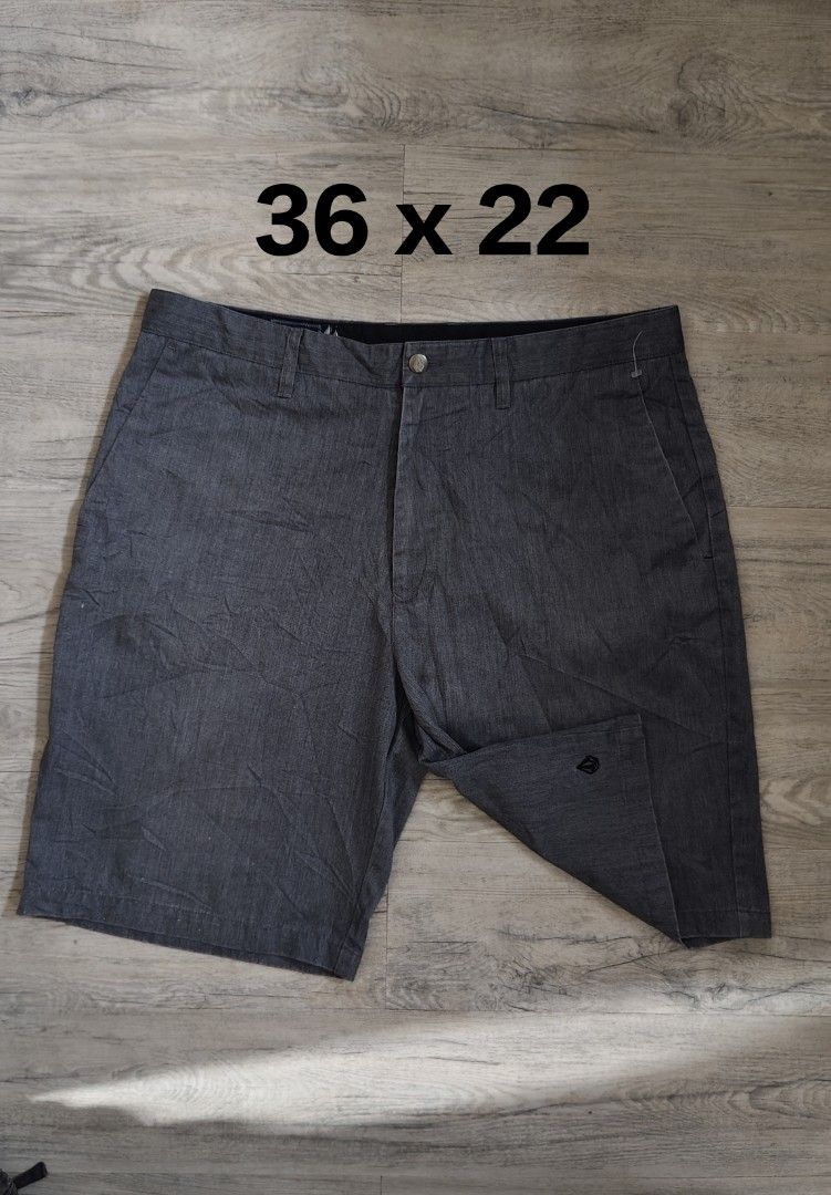 Volcom Grey Shorts Size 36 (Category: Shorts) located in Quezon City. Submitted by truedeer_cda94c (Listing ID 1470601474, Image 1). Description: - Brand: Volcom - Size: 36 - Color: Dark charcoal heather grey - Style: Casual cut with button closure - Pockets: Multiple pockets in the back - Details: Clean inside lining with branded tag - Condition: Great for everyday wear, easy to match with tees or polos.