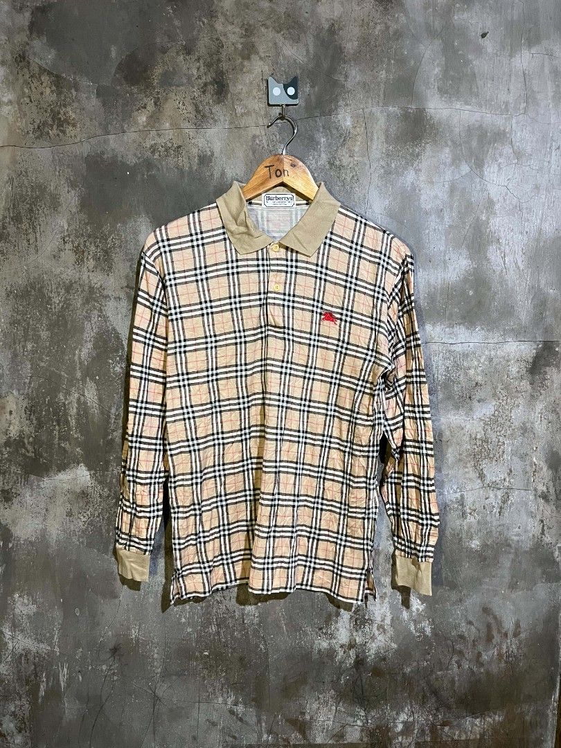 Vtg Burbrry Polo L/S (Category: Luxury Apparel) located in Andop. Submitted by tonthrift_st (Listing ID 1470682627, Image 1). Description: Vtg Brbrry Polo S/L Plaid Excellent condition Size Small on tag Dimes W19.5 L26 Issue pinhole see last pic 🏷️📥 📍Kapalong, Davao del Norte.