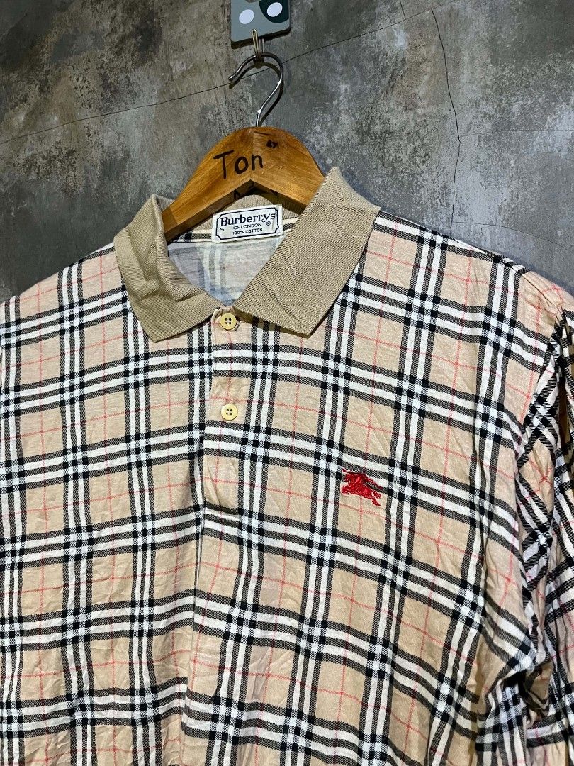 Vtg Burbrry Polo L/S (Category: Luxury Apparel) located in Andop. Submitted by tonthrift_st (Listing ID 1470682627, Image 2). Description: Vtg Brbrry Polo S/L Plaid Excellent condition Size Small on tag Dimes W19.5 L26 Issue pinhole see last pic 🏷️📥 📍Kapalong, Davao del Norte.