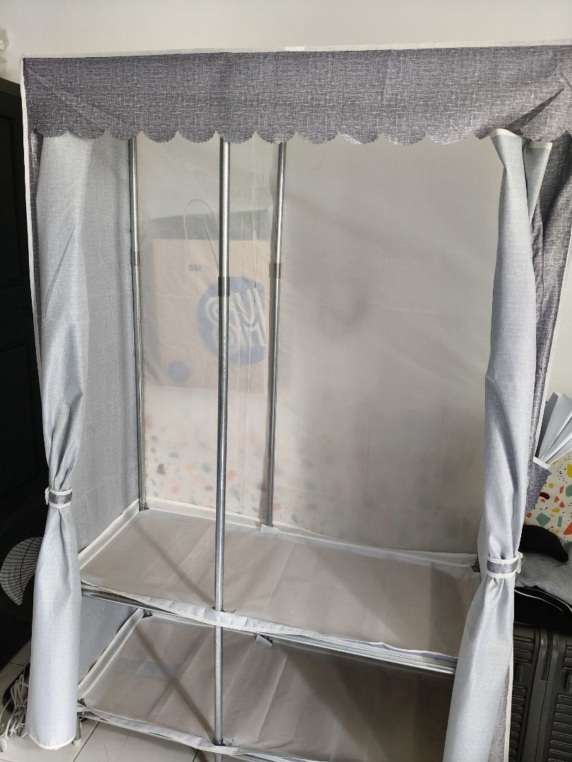 Wardrobe metal rack (Category: Shelves, Cabinets & Racks) located in Pasig City. Submitted by giii9628 (Listing ID 1470695403, Image 2). Description: Leego wardrobe metal rack 110cm width Like new with 2 side pockets with box, complete parts spare parts for each type also complete.