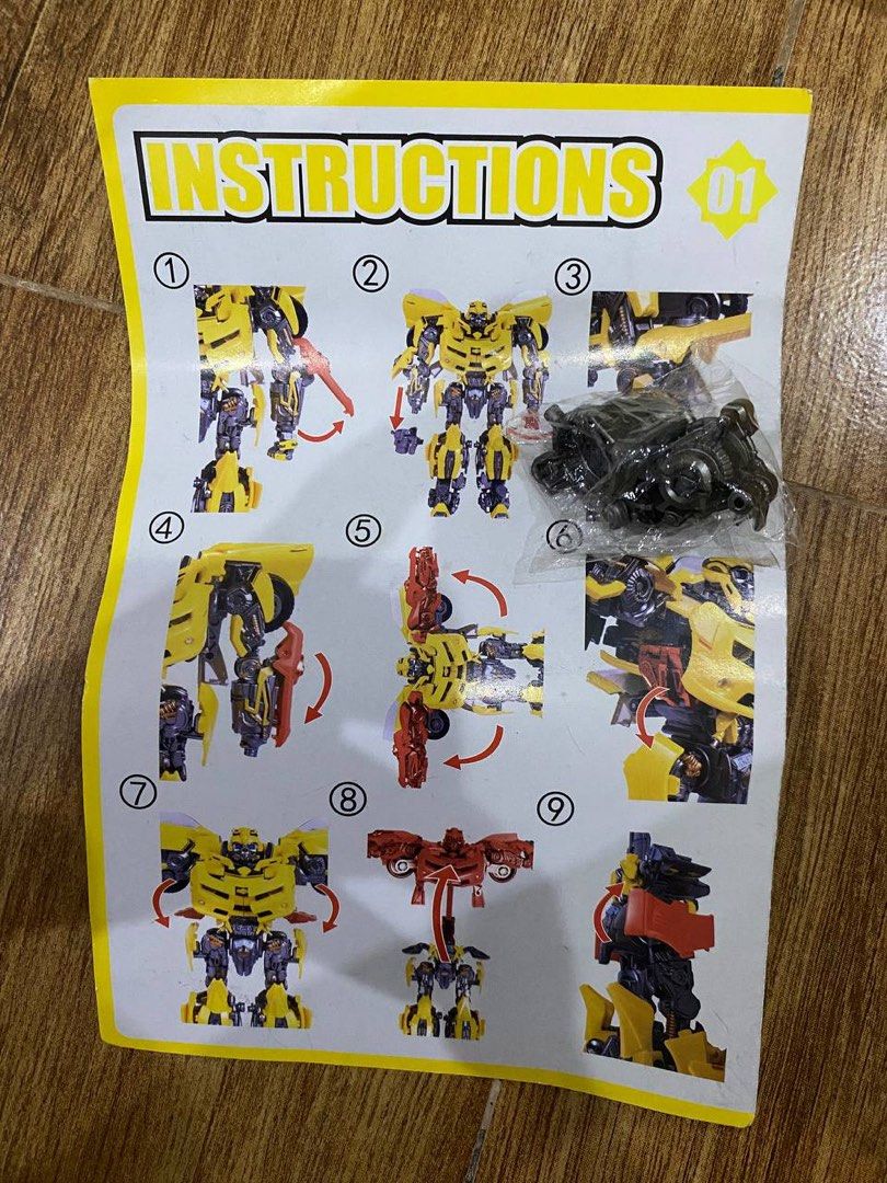Wasp Warrior Bumblebee with Box (Category: Action & Battle Toys) located in Davao. Submitted by muhammadbalindong (Listing ID 1470561598, Image 3). Description: - Item: Wasp Warrior Robot Action Figure - Color/Design: Yellow and black armor with striking blue eyes and detailed mechanical parts - Feature: Fully transformable robot figure - Condition: Complete with original box packaging, plastic blister tray, and instruction manual.