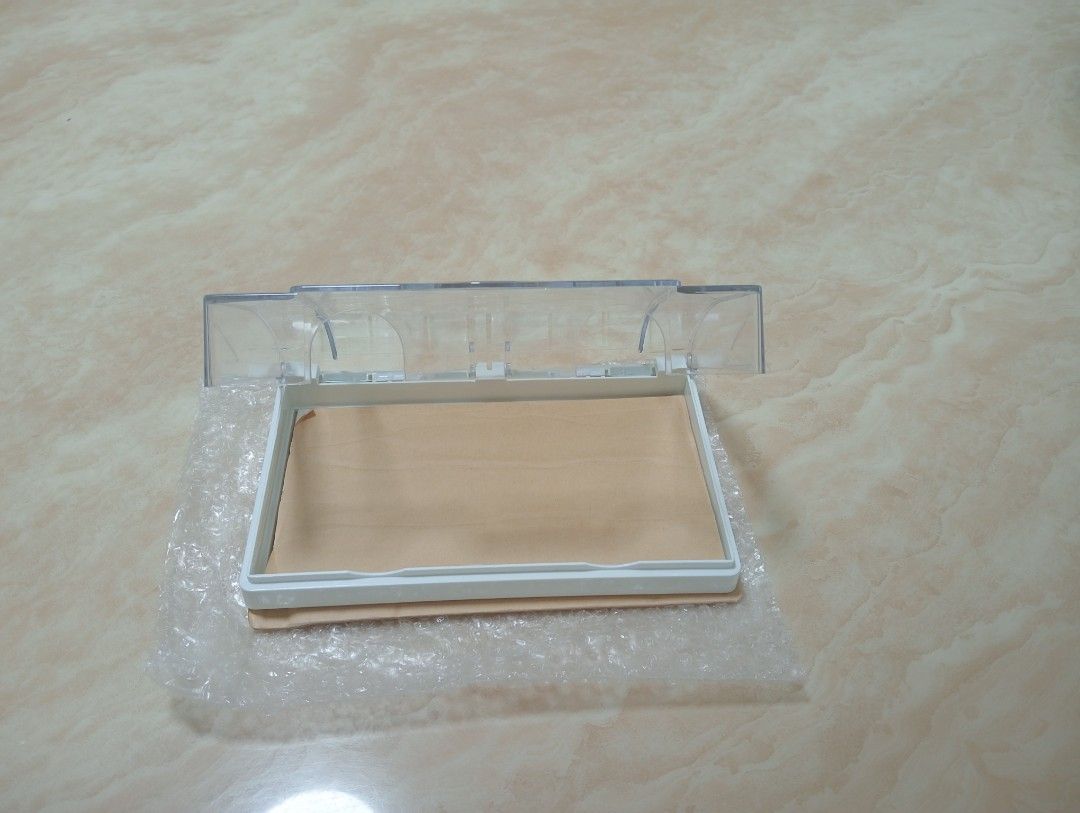 Waterproof Wall Switch Socket Box Protector (Category: Electrical, Adaptors & Sockets) located in Singapore. Submitted by meimei1982 (Listing ID 1470737421, Image 1). Description: Clear plastic cover with white base frame. Protects wall switches or sockets from water splashes. Opens and closes easily on hinges. Includes backing sheet and bubble wrap packaging. Unused item, ready to install in bathrooms, kitchens, or outdoor areas..