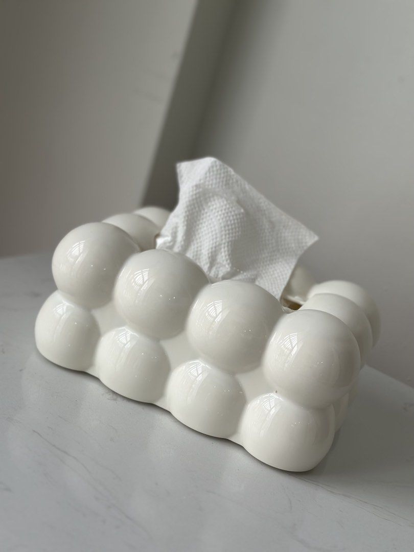 White Bubble Plastic Tissue Holder (Category: Storage Boxes & Baskets) located in Marikina City. Submitted by lovegoeson (Listing ID 1470724156, Image 1). Description: - Material: Plastic glossy finish - Design: Modern 3D bubble texture for a clean, minimal look - Fit: Accommodates standard rectangular tissue packs - Stability: Weighted base allows easy tissue pulling without lifting the cover - Versatility: Ideal decor for the living room, bedro