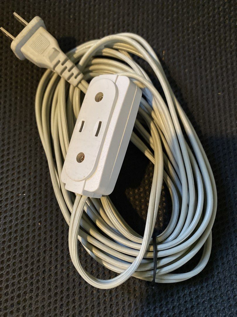White Extension Cord with 3 Outlets (Category: Electrical, Adaptors & Sockets) located in Cainta. Submitted by stuff_4_sale_dump (Listing ID 1470633340, Image 2). Description: standard two-prong plug approx 5 meters long like new, neatly stored.