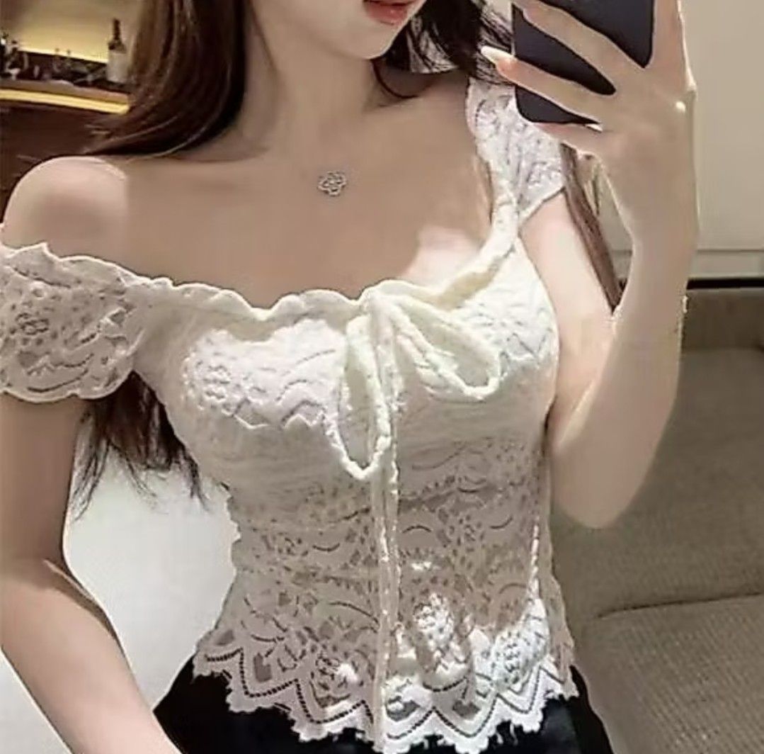 White Laced Blouse Top (Category: Blouses) located in Manila. Submitted by littlenicsfinds (Listing ID 1470675348, Image 1). Description: small to large, stretchy fitted body hugging.