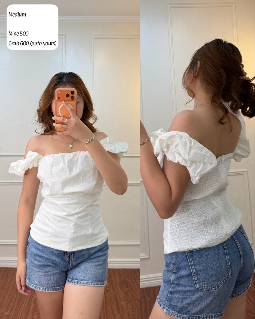 White Off-Shoulder Puff Sleeve Smocked Top Medium (Category: Blouses) located in Manila. Submitted by angelll0123 (Listing ID 1470699490, Image 1). Description: - Color: White - Size: Medium - Style: Fitted off-shoulder with puff sleeves - Back: Elastic smocking for comfortable fit - Front: Smooth fabric with subtle texture - Pairing: Perfect with denim shorts or jeans.