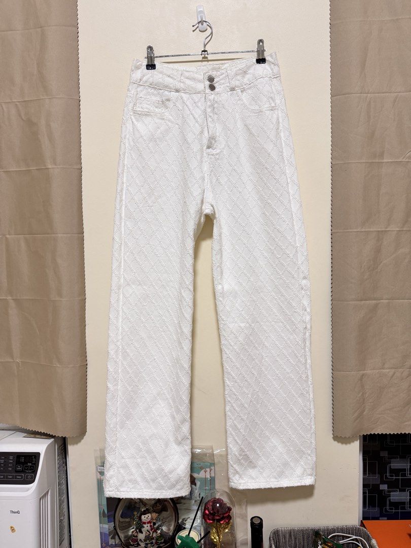White Pants (Category: Jeans) located in Manila. Submitted by seayouncey (Listing ID 1470671586, Image 1). Description: Size: 30 inches Length 42 inches - Color: Clean white - Design: Diamond checkered textured pattern - Fit: High waisted, straight wide leg with raw hem - Closure: Double button and zipper fly - Pockets: Standard front and back pockets - Condition: Great overall.