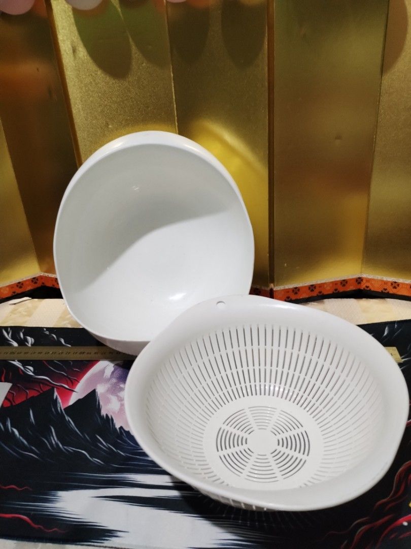 White plastic colander and strainer bowl set (Category: Dinnerware & Cutlery) located in La Trinidad. Submitted by malditas (Listing ID 1470705150, Image 1). Description: - 2-in-1 kitchen set: white plastic colander and matching outer bowl - Slotted drainage design with extra perforated holes on the outer bowl - Handy hanging hole on the rim for easy storage - Ideal for washing fruits, vegetables, and draining pasta From HT box BUY AS IS (NO RETU