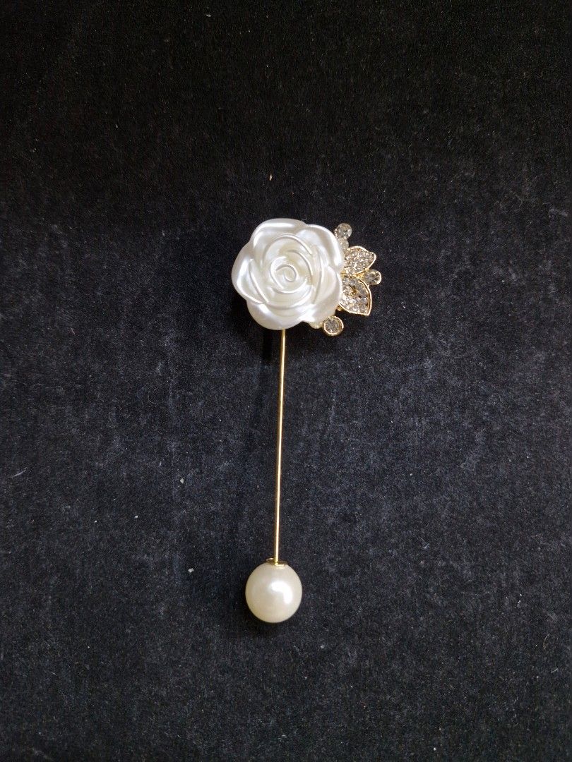 White Rose Pin Brooch (Category: Brooches) located in Taguig. Submitted by mommaschoice (Listing ID 1470611882, Image 1). Description: Brand New Pin Design Perfect for suits & party dresses Lightweight won't damage the fabric Ships nationwide.