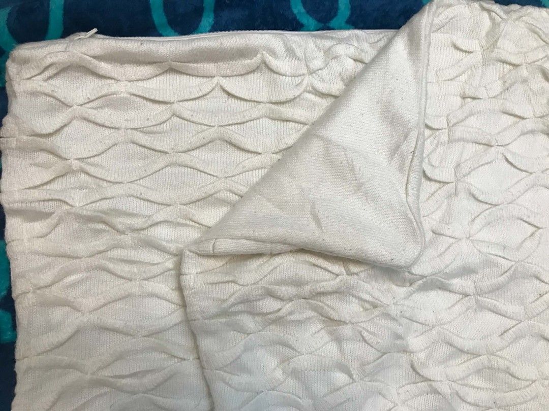 White textured decorative cushion cover set pillow case (Category: Cushions & Throws) located in Imus. Submitted by stop_shop7 (Listing ID 1470651033, Image 2). Description: - Set of 2 white cushion covers - Soft knit fabric with a stylish geometric wave pattern - Clean off-white color complements any neutral home decor - Standard square shape with a seamless hidden zipper closure - Easy to use and 100% machine washable.