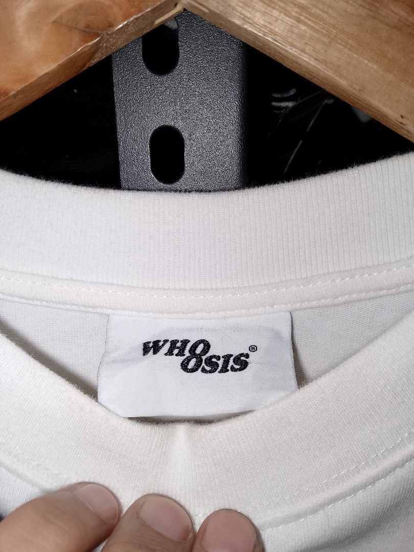 Whoosis Embroidered Floral White Tee (Category: Tshirts & Polo Shirts ) located in Manila. Submitted by mjthrifted_second (Listing ID 1470608513, Image 3). Description: - Brand: Whoosis -Size: Small -Dimes: 22/28 - Color: White with blue morning glory flowers and green vines - Material: 100% cotton - Design: Detailed floral embroidery and bold black typography on front and back - Fit/Style: Short sleeves, crew neck.