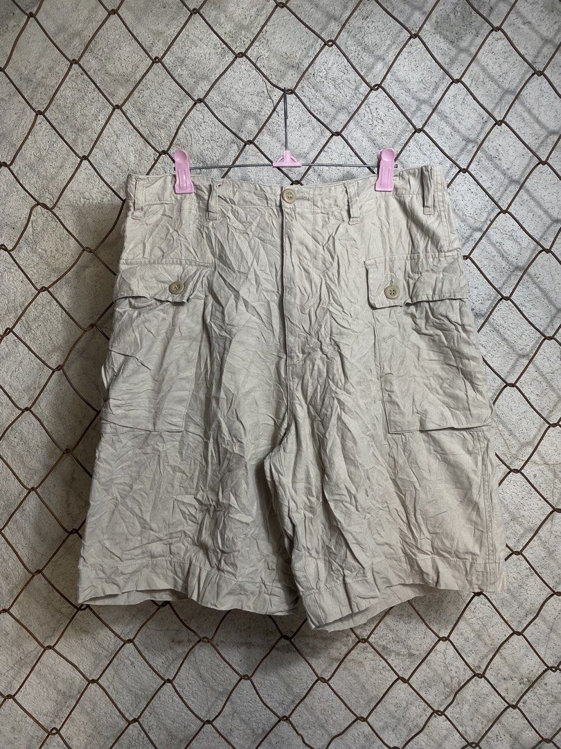 Wild Machine US Army Style Khaki Cargo Shorts (Category: Shorts) located in Cabanatuan. Submitted by adrialesdrip (Listing ID 1470595429, Image 1). Description: Wild Machine khaki cargo shorts in relaxed fit, size tagged inside. Made of 100% cotton with multiple utility pockets and button fly. Features a cool U.S. ARMY MLT217 print on the back pocket. Great for daily casual wear. Message for inquiries! Width love machine u,s army MLT217 monkey sh