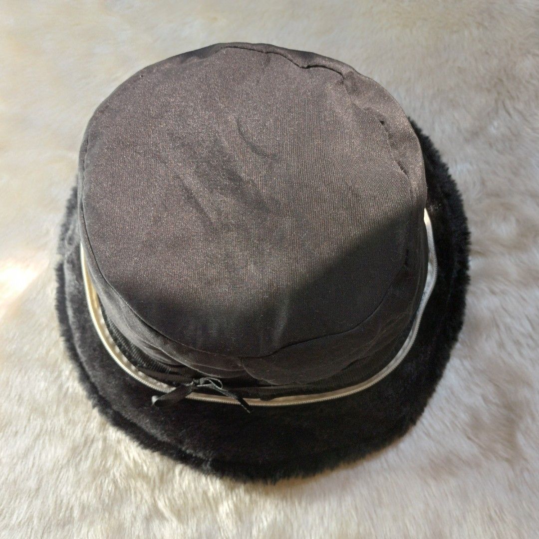 Winter Warm Reversible Bucket Hat with Removable Ear Flaps (Category: Hats & Beanies) located in Pasig City. Submitted by eden_online_shop (Listing ID 1470616395, Image 3). Description: - Color: Black - Reversible Design: Wear it two ways to match your outfit. - ​Detachable Ear Flaps: Zip or unlatch the ear covers for extra warmth or a classic bucket hat look. - ​Cozy & Warm: Soft faux fur material keeps you insulated against the cold. - Material