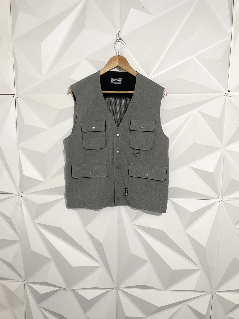 Work Power Grey Utility Vest Size L (Category: Vests) located in Cabuyao City. Submitted by ParadisethriftedPh (Listing ID 1470729641, Image 1). Description: Cr: 9.8/10 Dimensions W: 21 L: 24 - Brand: Work Power - Size: L - Color: Grey with black mesh lining - Features: Multiple front pockets with button flaps, small D-ring on the right chest, breathable mesh back - Closure: Front button - Condition: Clean, great pre-loved condition - Style: Perf