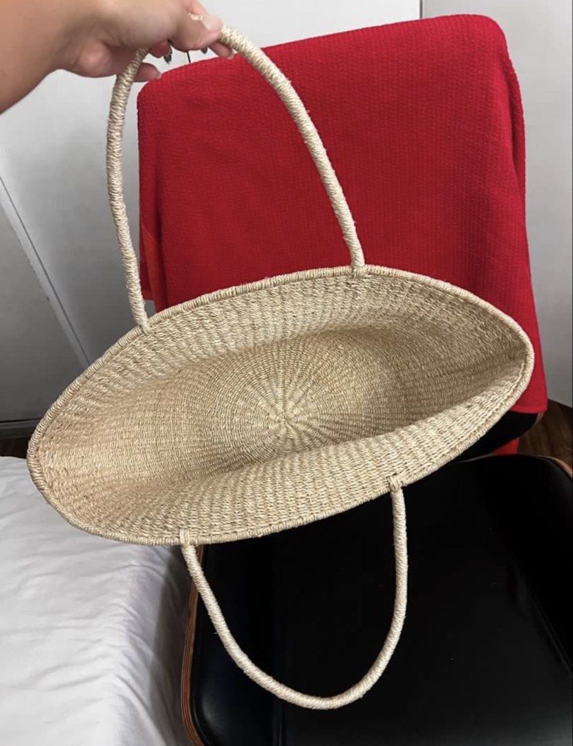Woven Straw Beach Basket Native Abaca Bag Large (Category: Beach Bags) located in Paranaque City. Submitted by closetcore (Listing ID 1470693324, Image 3). Description: - Material: Natural woven straw in a versatile neutral beige - Design: Stylish crescent shape with sturdy double top handles - Size & Capacity: Spacious interior that easily fits a laptop and daily essentials - Perfect For: Beach days, market runs, casual outings, and summer trave