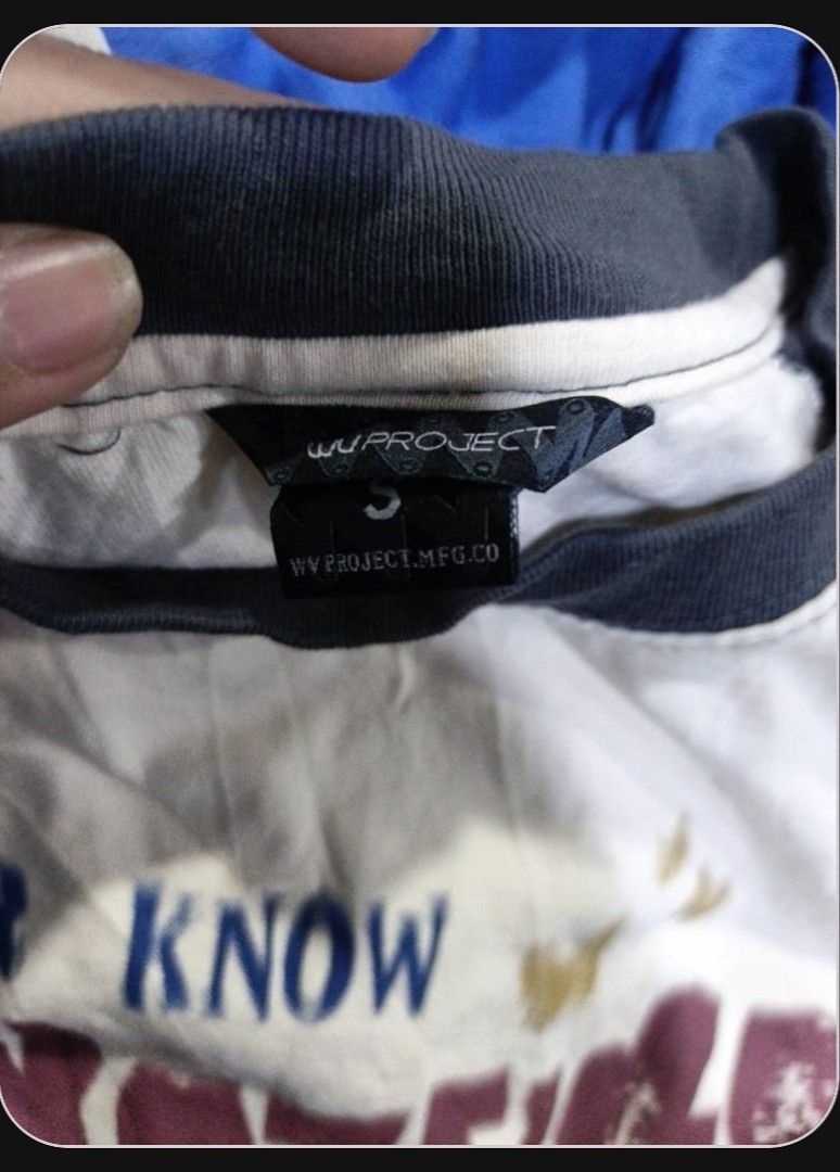 WV Project Raglan Graphic T-Shirt (Category: Tshirts & Polo Shirts ) located in Manila. Submitted by swaggthriftt (Listing ID 1470668176, Image 2). Description: - Brand: WV Project - Style: Classic baseball tee / raglan t-shirt - Size: S - Color: Dark grey sleeves with off-white body - Design: Bold multi-color graphic print on front ('NEVER KNOW WHATEVER new PROJECT TO SHINE THROUGH') - Material: Comfortable cotton fabric - Condition: Great daily