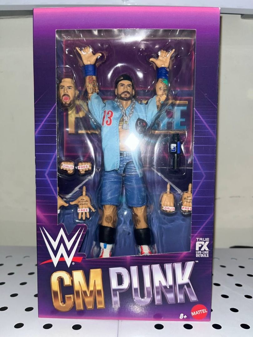 WWE CM PUNKLIFE (Category: Action & Battle Toys) located in Manila. Submitted by ralphej (Listing ID 1470686127, Image 1). Description: - Item: WWE CM Punk Action Figure by Mattel - Condition: Brand new, unopened in clean purple box packaging - Includes: Extra interchangeable hands, alternate head sculpt, chain necklace, blue shirt, and microphone accessory - Perfect for: Wrestling fans and serious collectors - Shipping: Packed securely for safe 